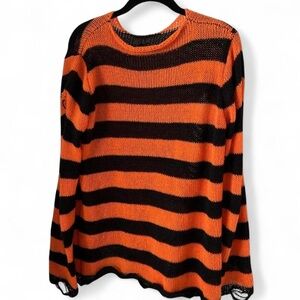 Ripped halloween sweater